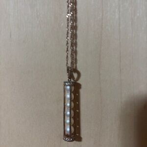 2 faux pearl necklaces